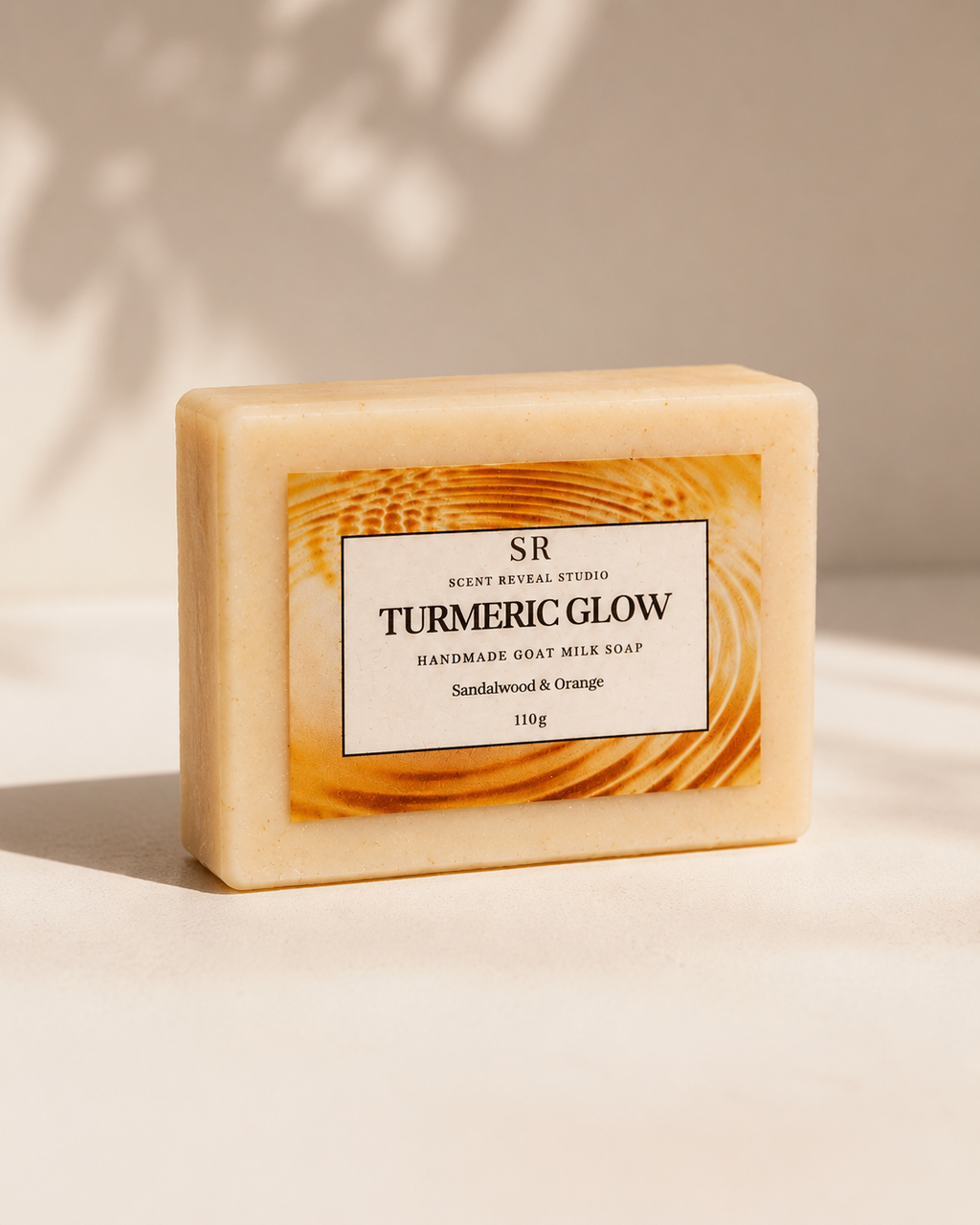 Artisan turmeric brightening soap made with goat milk, black pepper, and sandalwood.